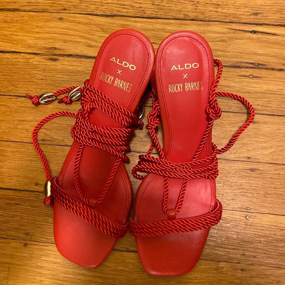 Aldo x Rocky Barnes red strappy heels.